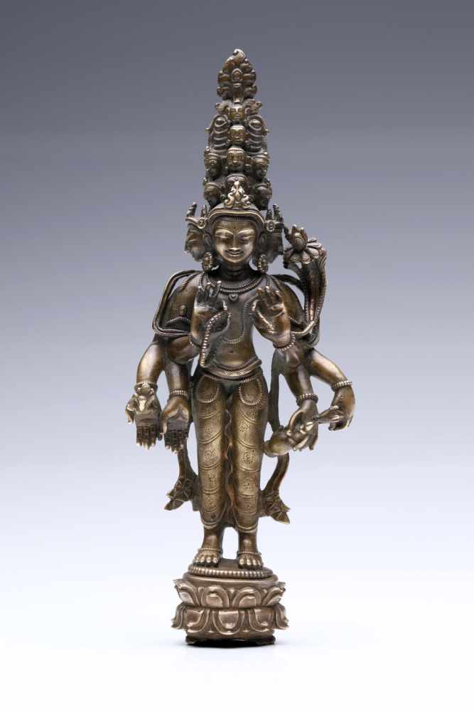 AvalokitesvaraBronze,Tibet, 18th century or earlier, in Pala Dynasty style,H: 24,5 cm11-headed and