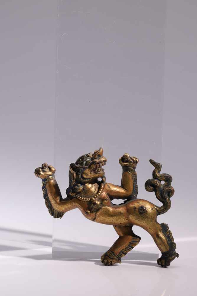 SnowlionBronze, rest gilt,Tibet, 18th centuryH: 8 cmThe snow lion is a celestial animal and the