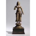 SitaBronze,India, 18th centuryH: 18 cmStanding in tribhanga pose on a lotus base, her right arm