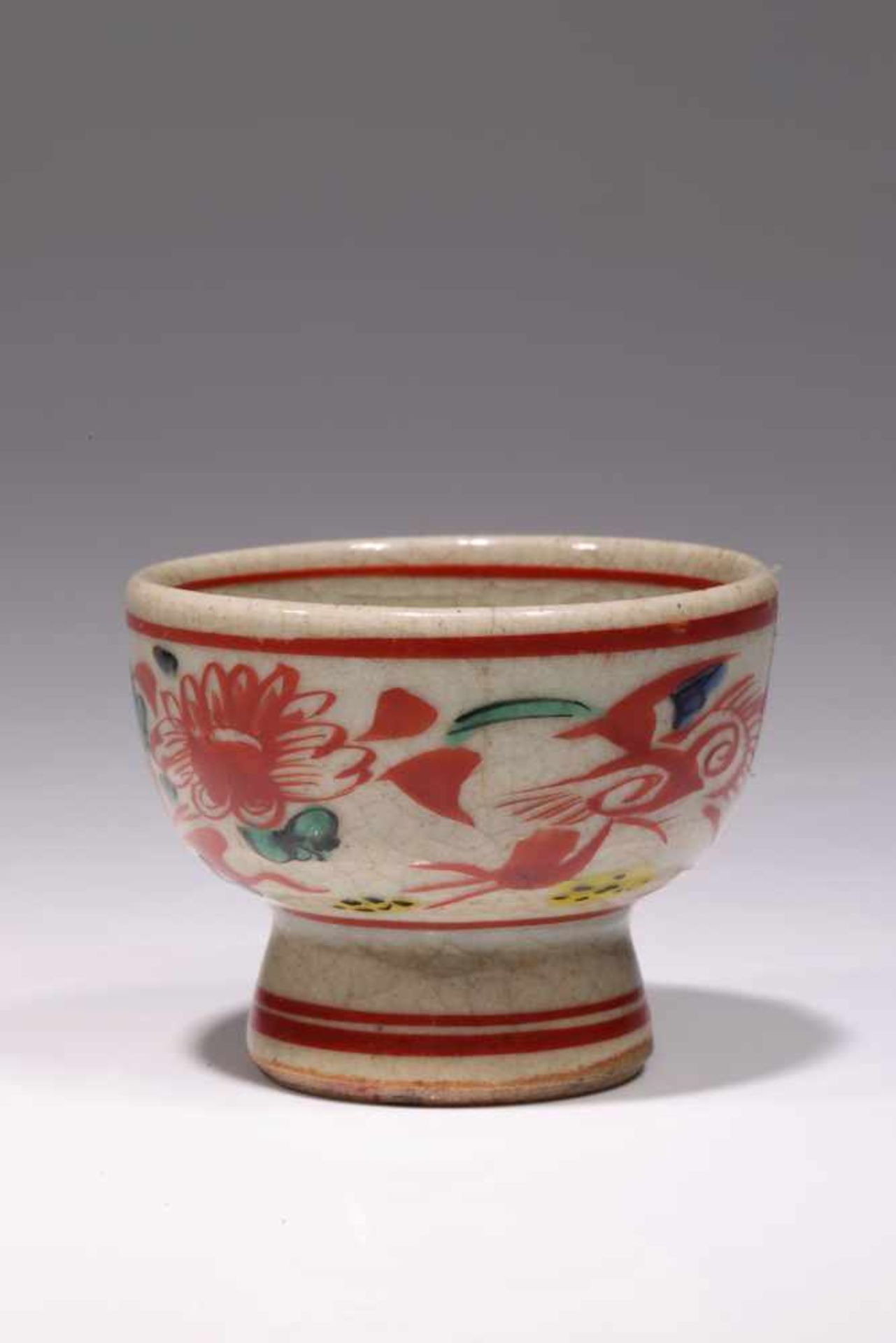 CUPporcelain,China, 19th century,Size: 9 cmA delicately glazed cup with red border lines on top