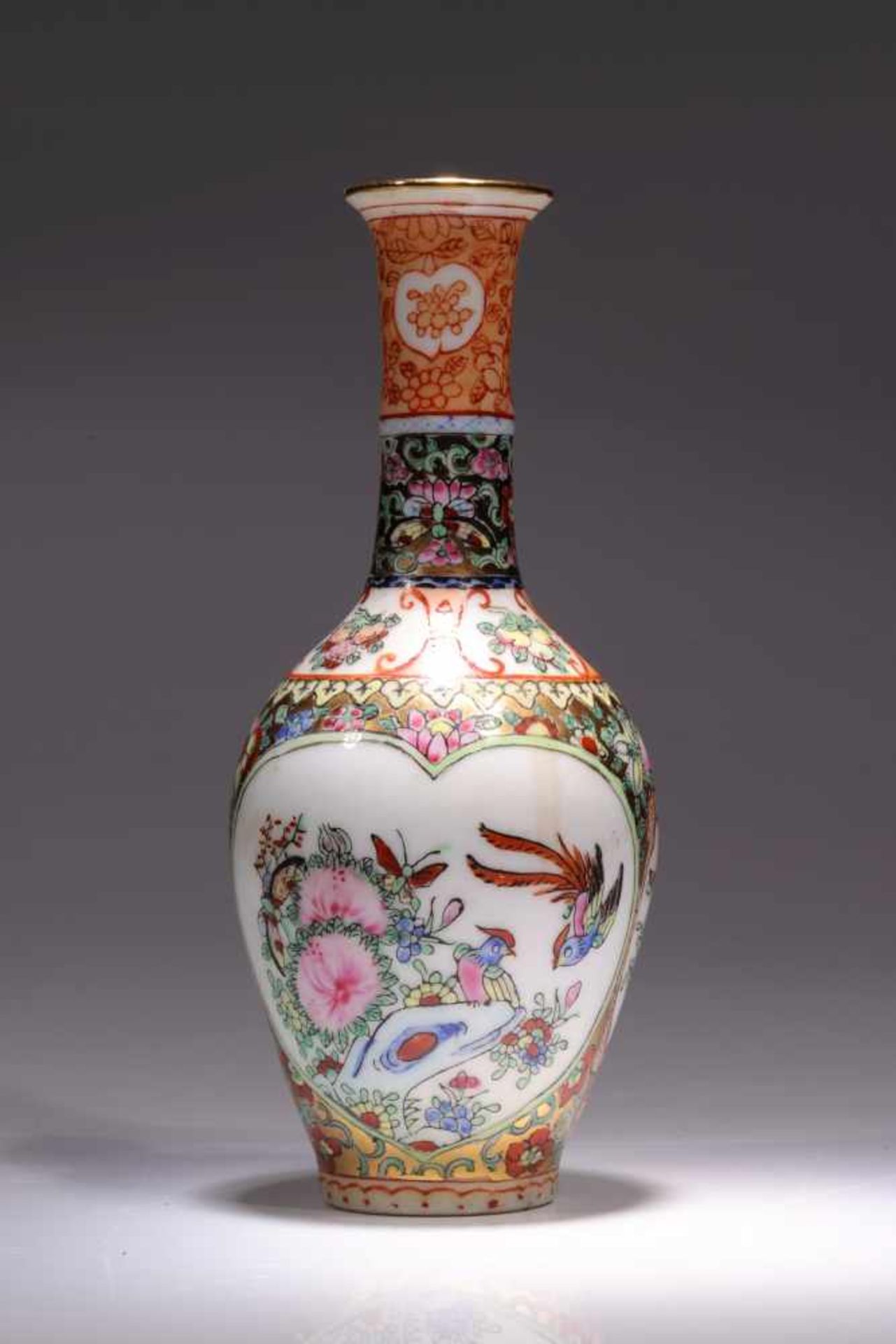 SIGNED VASEporcelain,China, 18th century,Size: 13 cmColourfully painted vase with various floral