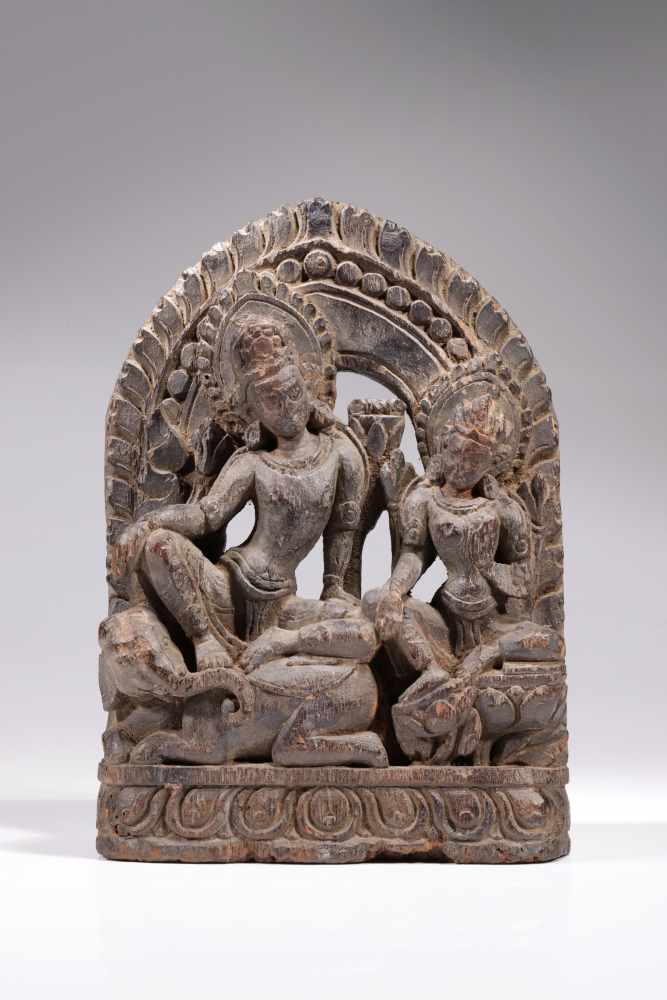 INDRA AND INDRANIwood carved,Nepal, 17th century,Size: 29 cmIndra is a vedic deity in hinduism,