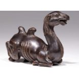 CAMEL PAPER WEIGHTbronze,China, 19th century,Size: 7 cm x 6 cmLying camel, mouth wide open, the fell