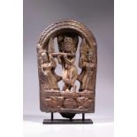 JAI KRISHNAgrey stone,Nepal, 17th century,Size 35 cm x 22 cmKrishna with two consorts, playing a