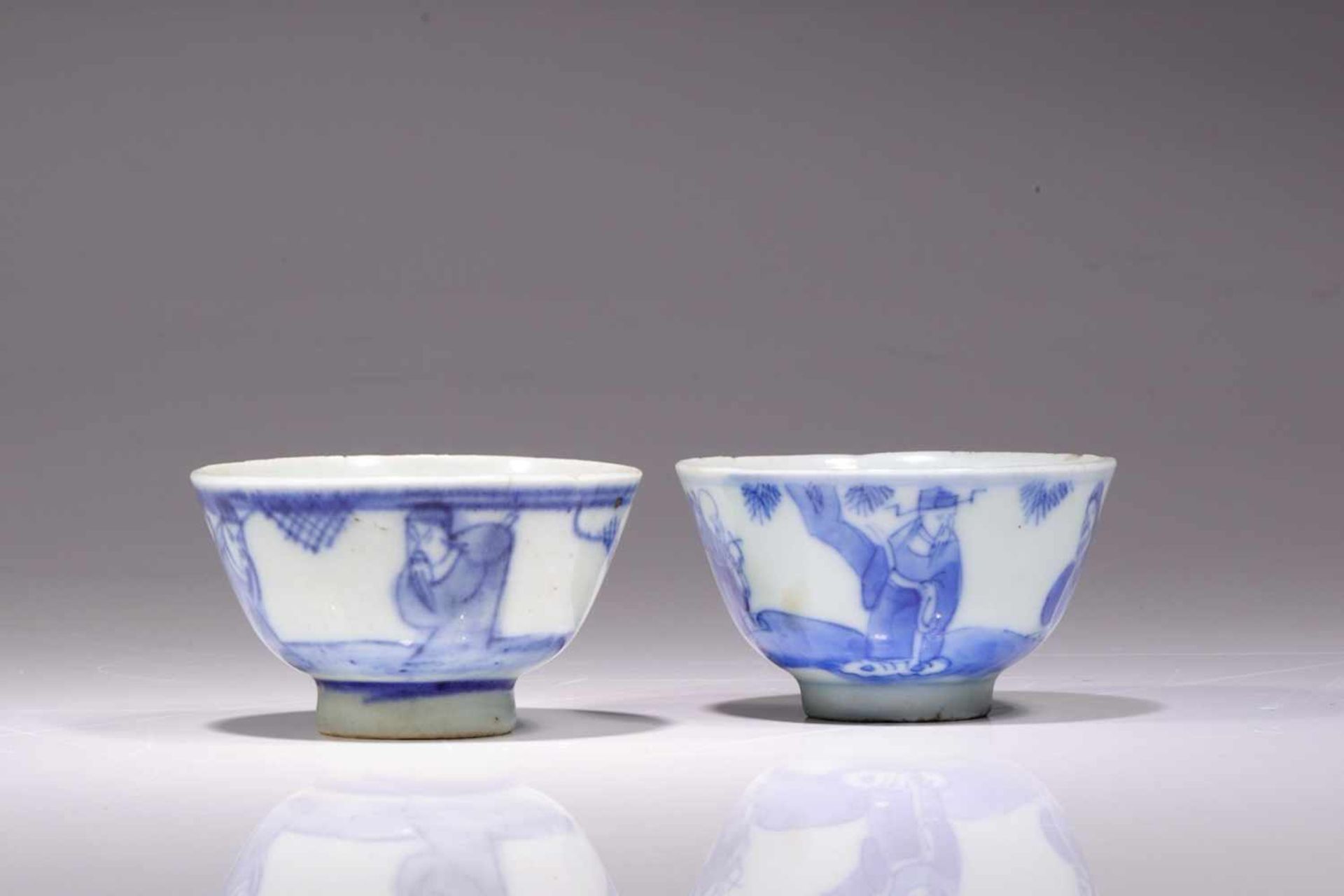 TWO TEA CUPSporcelain,China, 16th century,Size: 4 cmBlue white porcelain tea cups with paintings