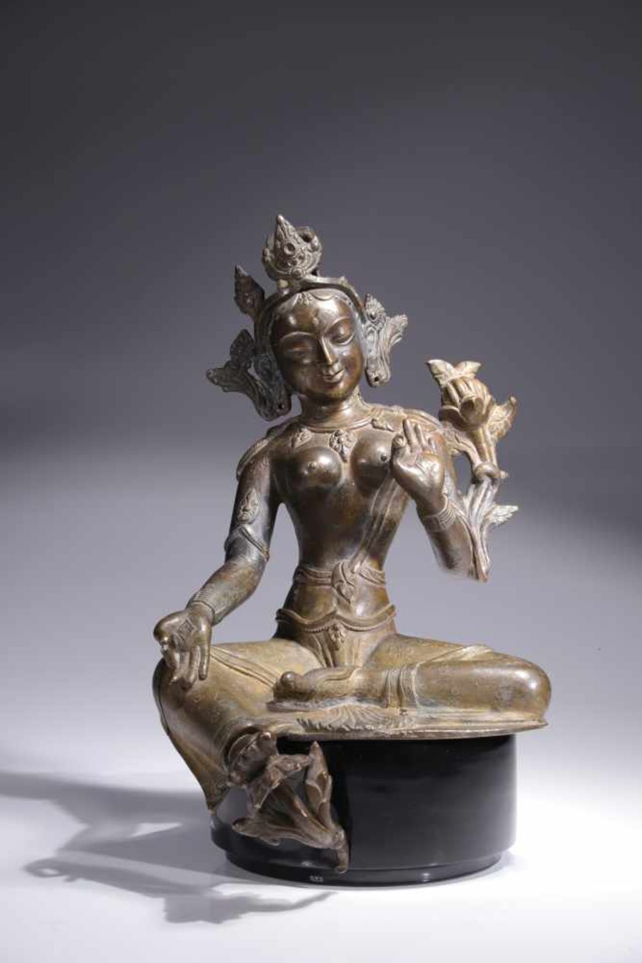 GREEN TARAbronze cast in 2 Forms,Nepal , 18th centurySize: 25 cmGreen Tara, with a lotus pedestal