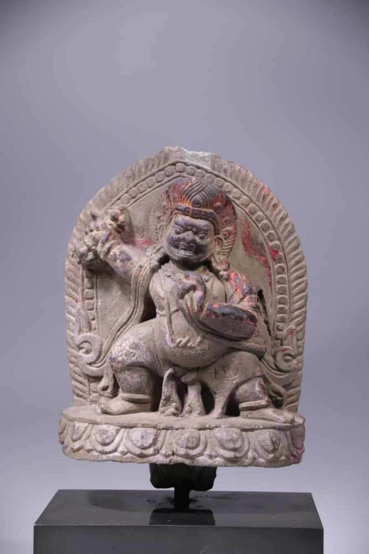 VAJRAPANIstone, Tibet or Nepal, 16th century,Size: 15 cmWrathful Vajrapani standing in a lunge