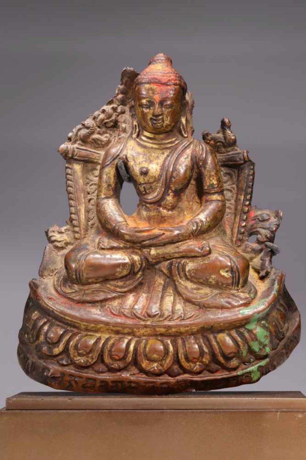 BUDDHAcopper repousse,Nepal, 15th century,Size: 14 cmSitting Buddha in meditative posture on a lotus