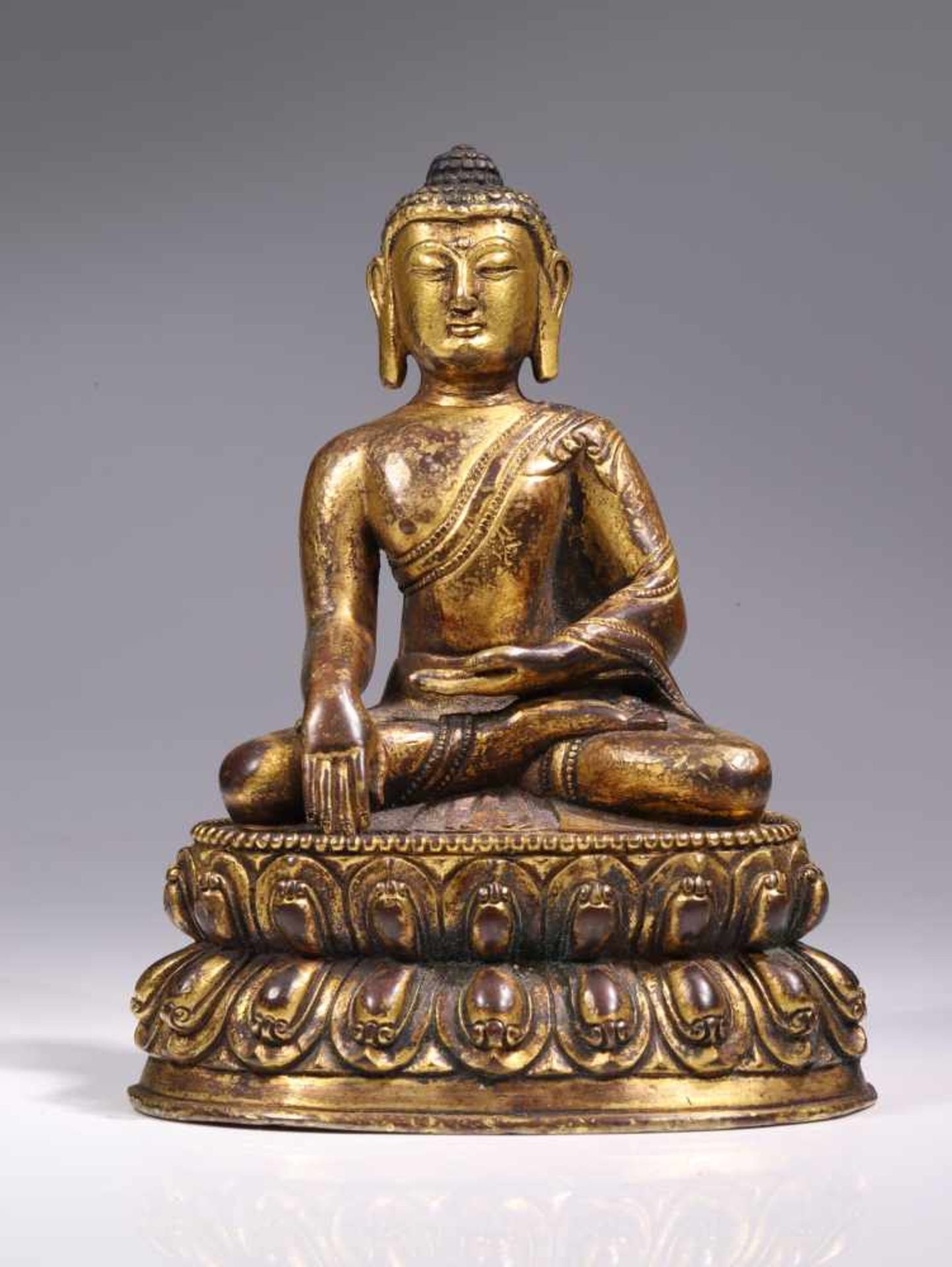 BUDDHABronze firegilt,China, 18th centuryDimensions: Height 14 cm / Wide 11 cm / Depth 8 cmWeight: