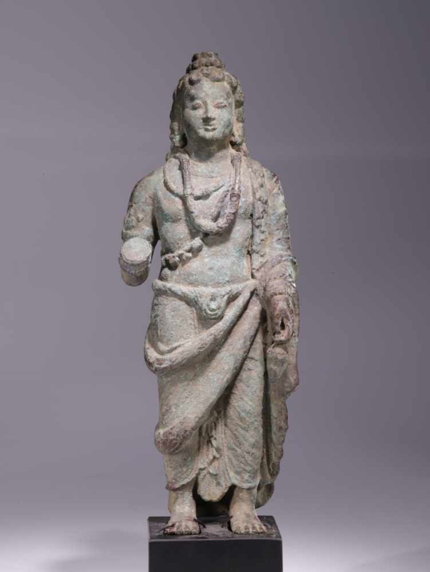 STANDING BUDDHA MAITREYABronze,Gandhara, 5th centuryDimensions: Height 35 cm / Wide 13 cm / Depth