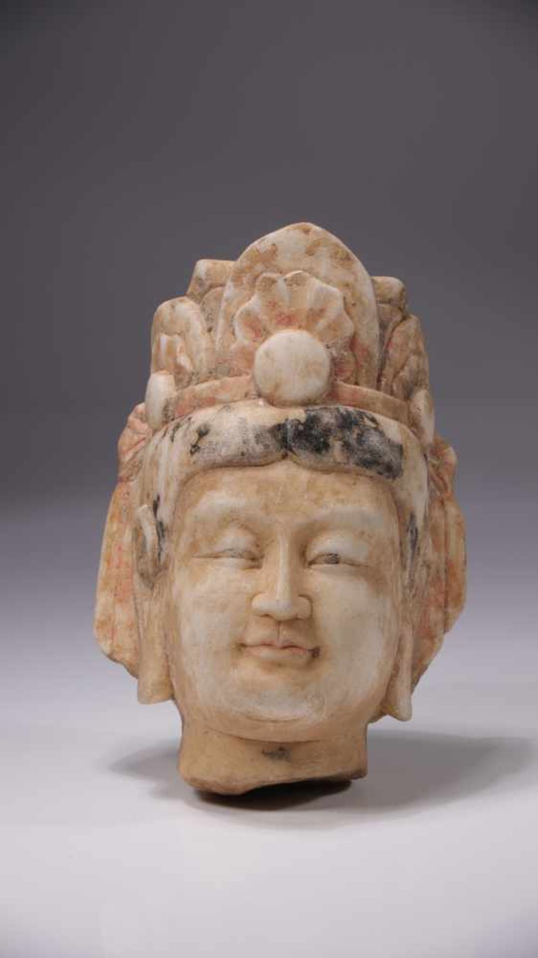 HEAD OF GUANYINMarbleChina, 16th centuryDimension: Height 15 cm / Wide 11 cm / Depth 10 cmWeight: