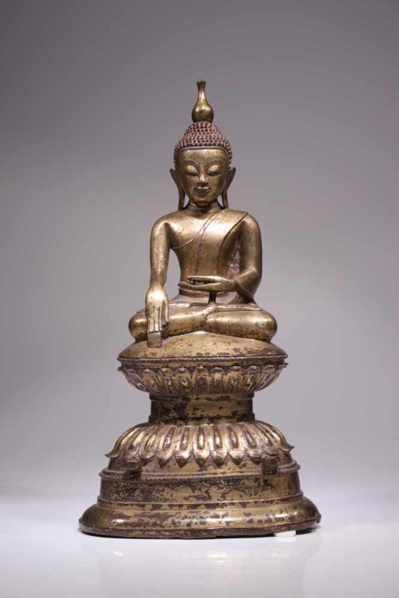 BUDDHA IN BHUMISPARSHA MUDRABronze, two adorants missingBirma, 17th / 18th centuryDimensions: