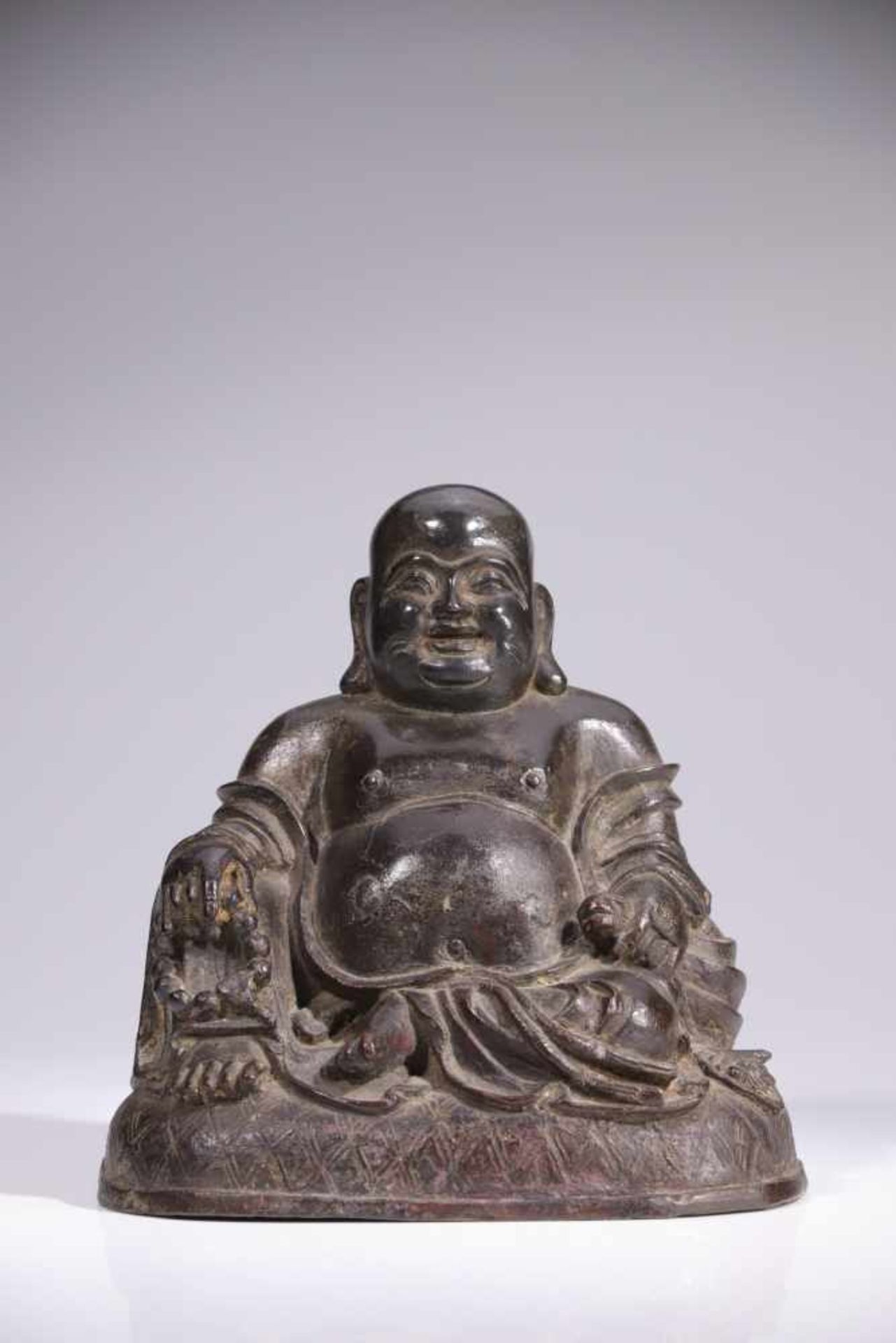 LUCKY BUDDHABronze,China, 17th centuryDimensions: Height 17, 5 cm / Wide 17 cm / Depth 12 cm Weight: