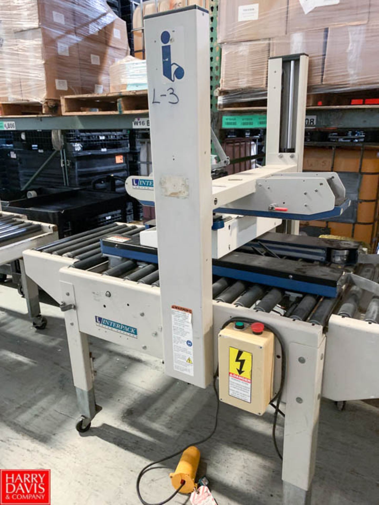 Interpack Top and Bottom Case Sealer Rigging Prices: 400