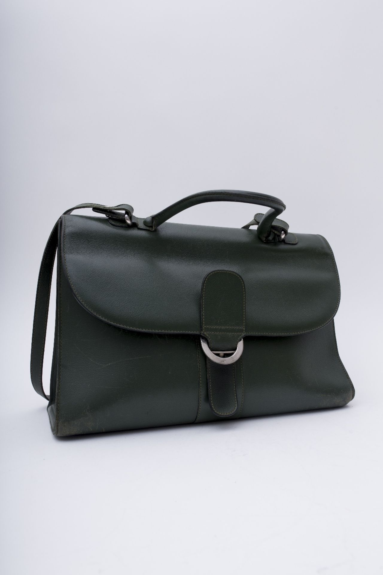 Delvaux Brillant handbag: Large model in full-grain forest-green leather, with shoulder strap.