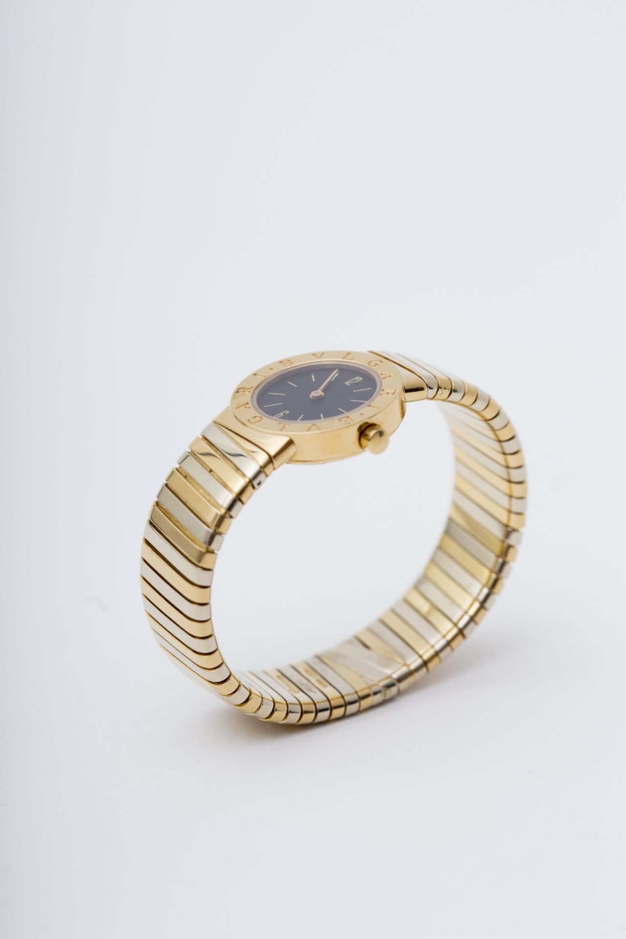 Bulgari Lady's Bulgari Tubogas watch: 18 kt yellow and grey gold, round dial, black lacquer face. - Image 2 of 2