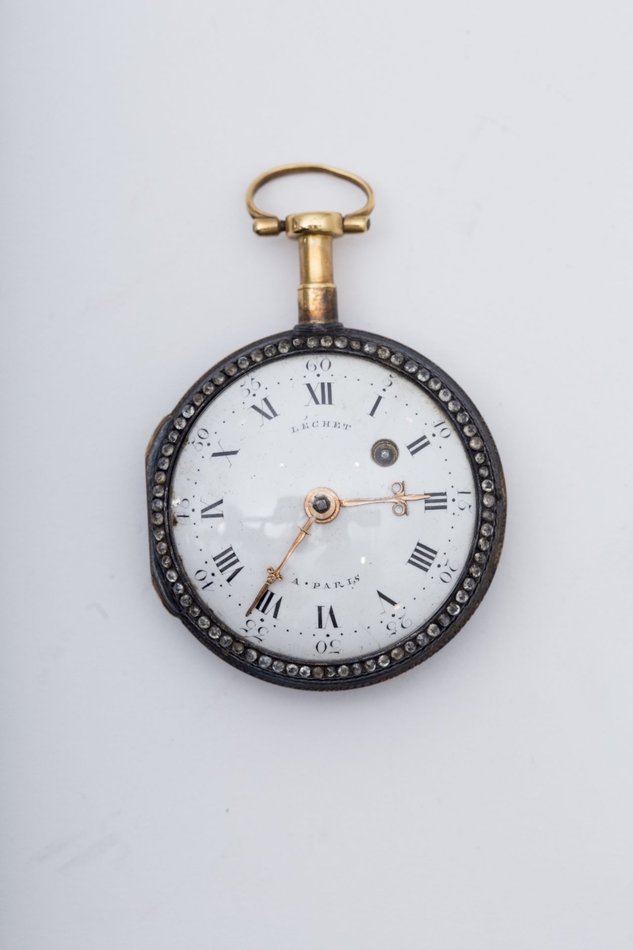 Léchet à Paris Pocket watch: 18 kt yellow gold and silver, back is enamelled with a scene of two