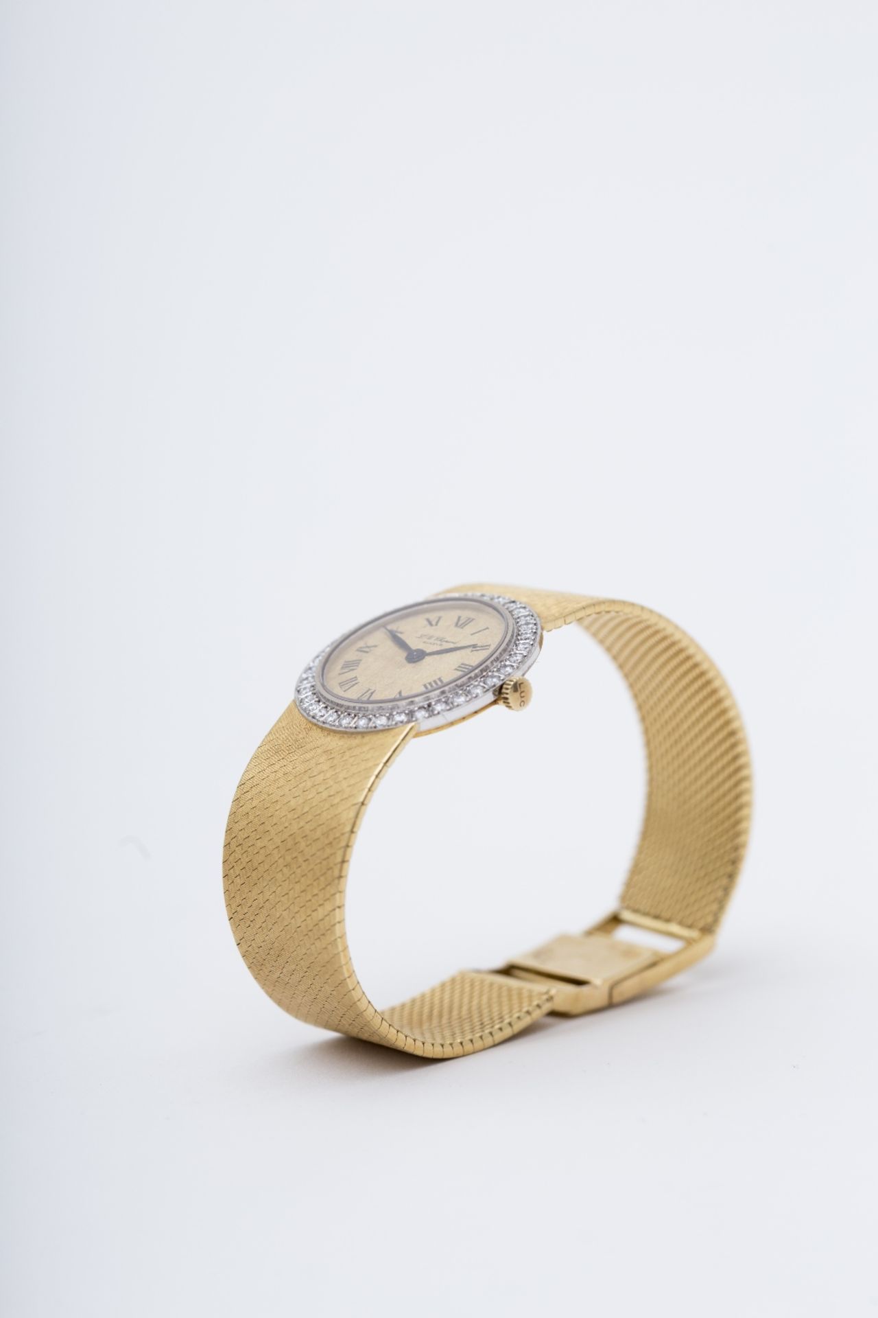 Chopard Lady's watch: 18 kt yellow gold with round dial, Roman numerals, framed with brilliants. - Image 2 of 2