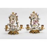 Meissen, 18th centuryPair of candleholders; Gilded bronze, decorated with rocaille and porcelain