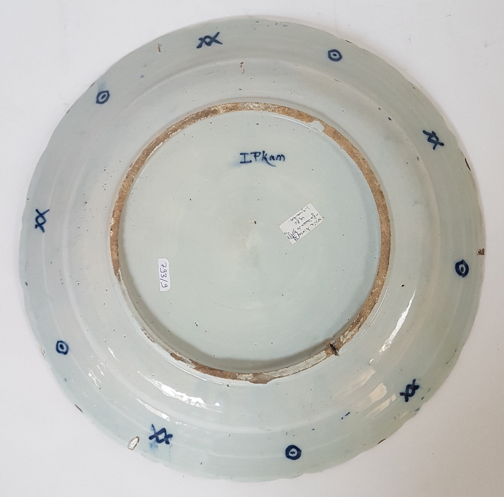 Delft, 18th centuryFlowering tree; Earthenware dish with blue décor on a white ground. Signed on the - Image 2 of 2