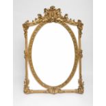 Large mirror with parecloses; Wood and gilded stucco. Slight damage. 162 x 112 cm