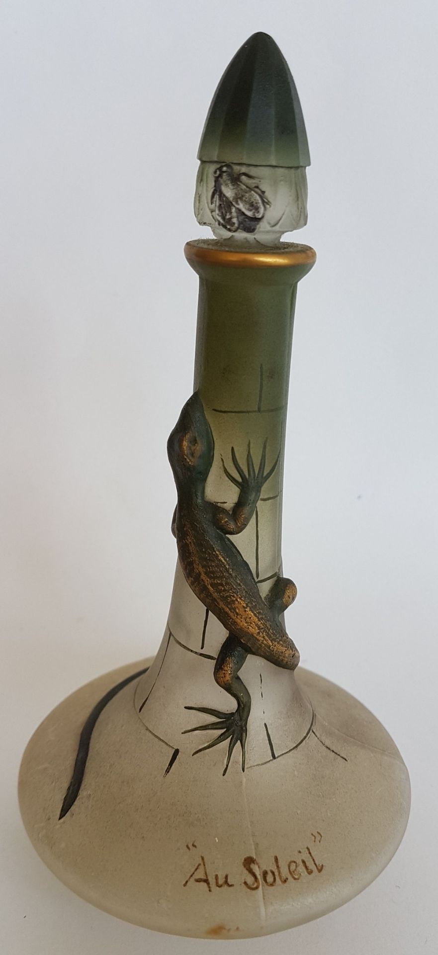 Lubin, ParisIn the sun, 1908; White matte satin glass flask with high relief décor of a lizard and a