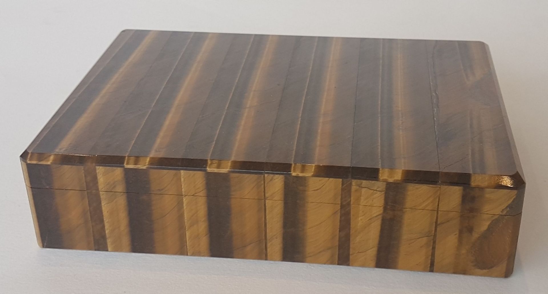 Tobacco box; Tiger's eye veneer. 3.5 x 15 x 10 cm