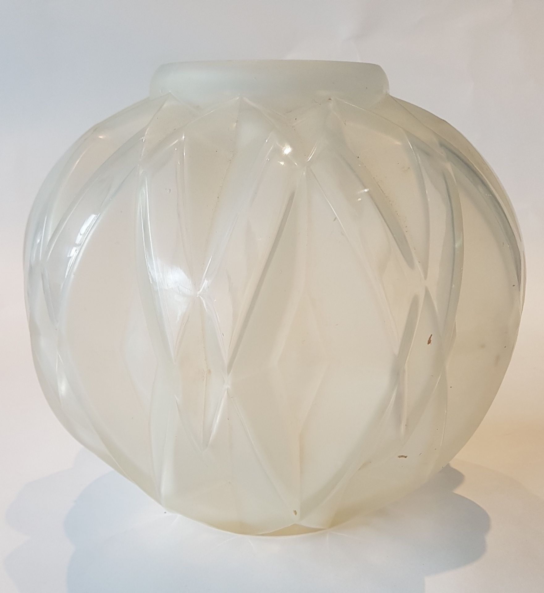 André Hunebelle (1896-1985)Prism; Moulded pressed opalescent white glass vase. Signed. H: 20 cm