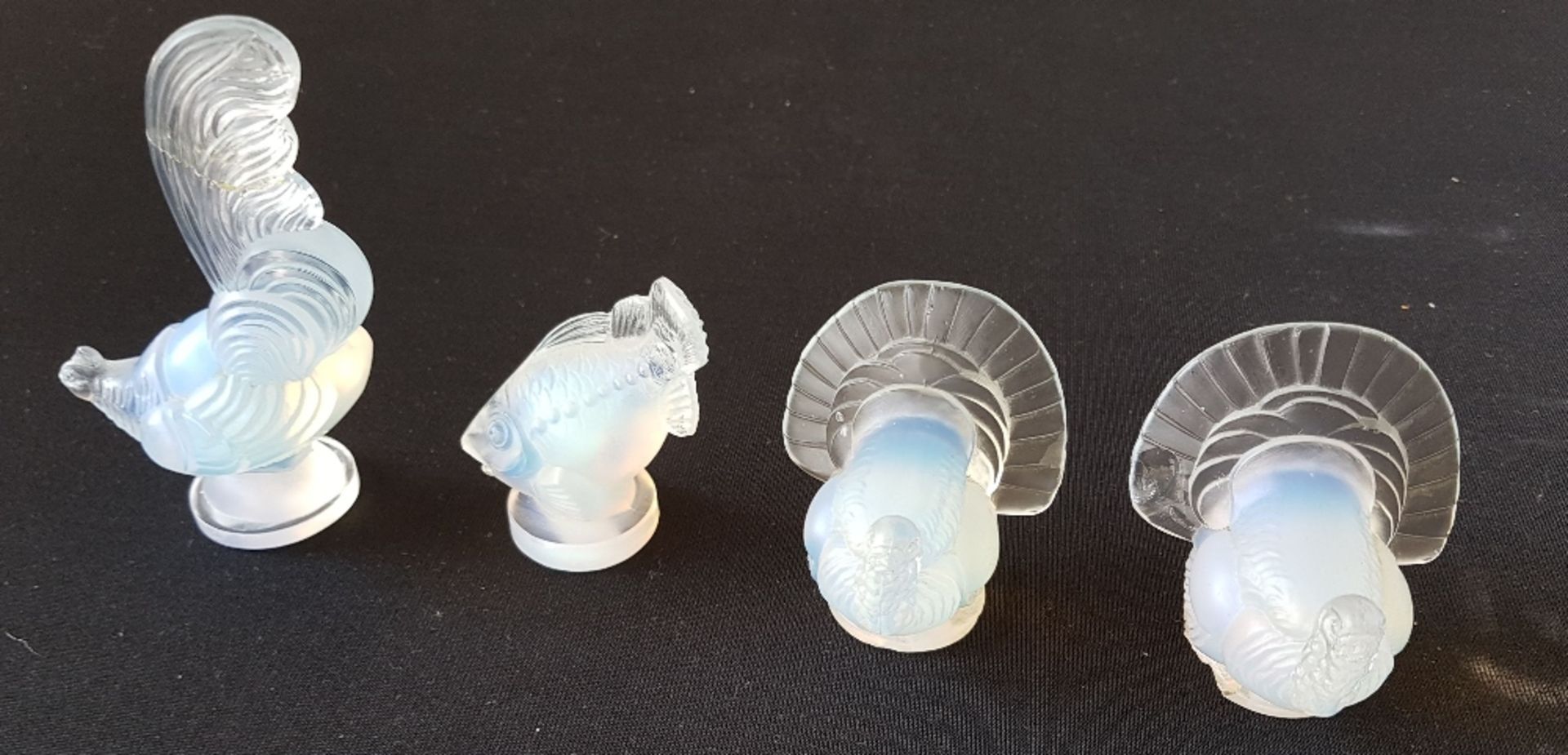 Sabino ParisFour figurines; Opalescent white moulded pressed glass. Each piece is signed. Rooster'