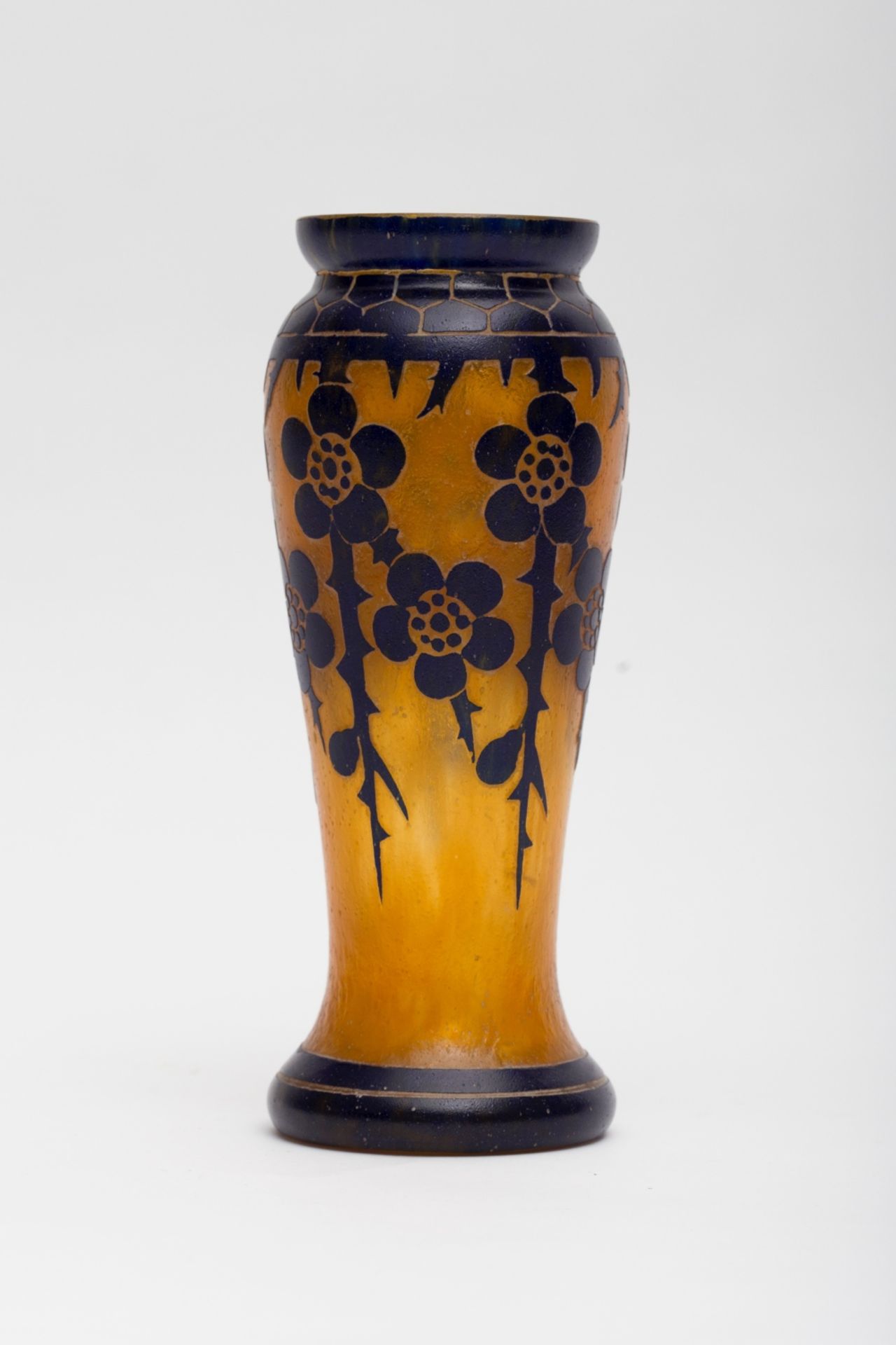 Le Verre FrancaisStylised flowers; Thick orange glass vase with blue acid-etched décor. Berlingot on