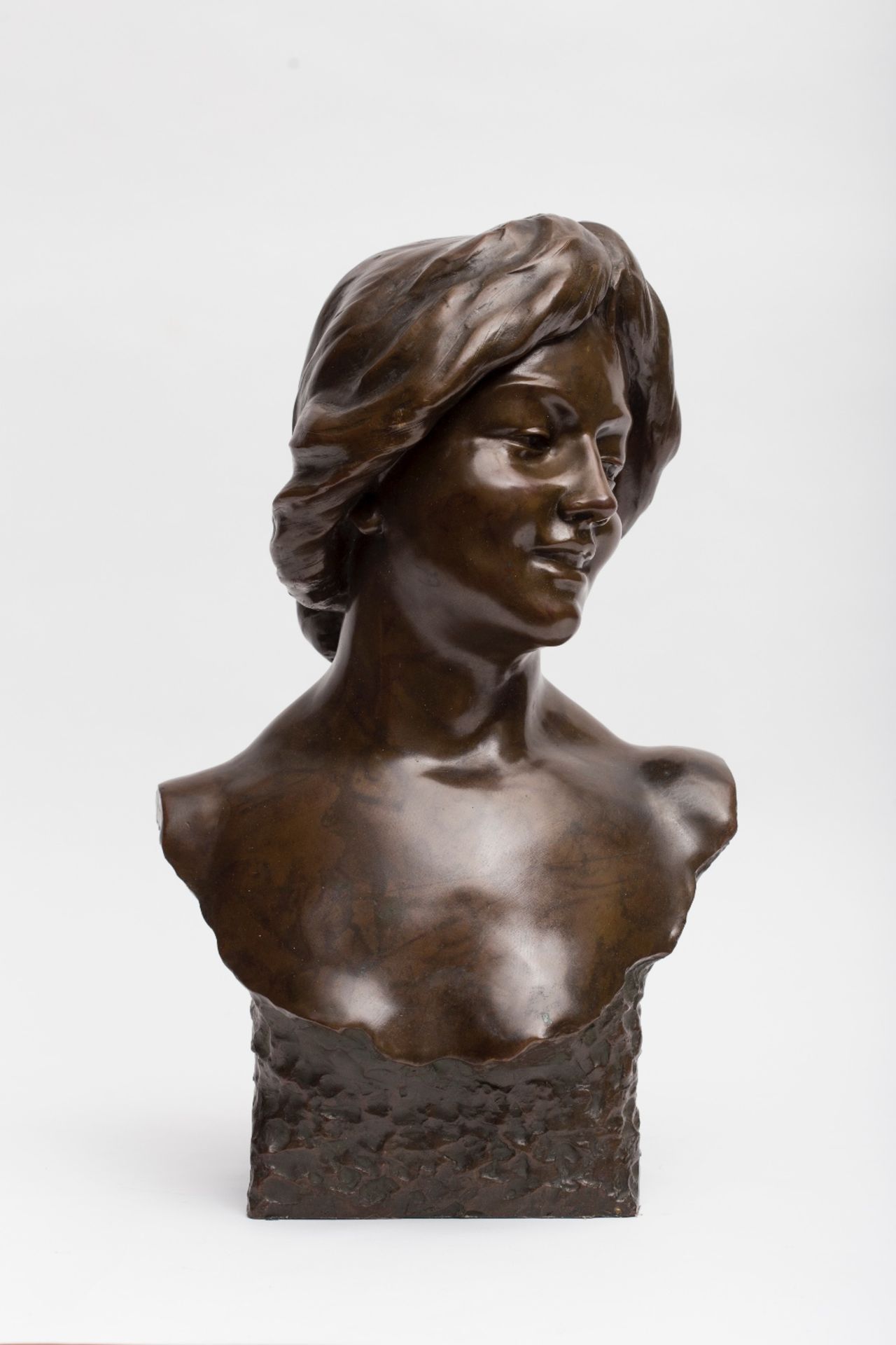 Arthur Puyt (1873-1955) Bust of a young woman; Bronze sculpture with brown patina. Signed on the