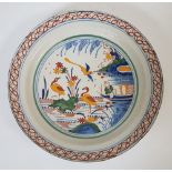 Delft, 18th centuryDish with Chinese design; Earthenware with a polychrome décor of a lively