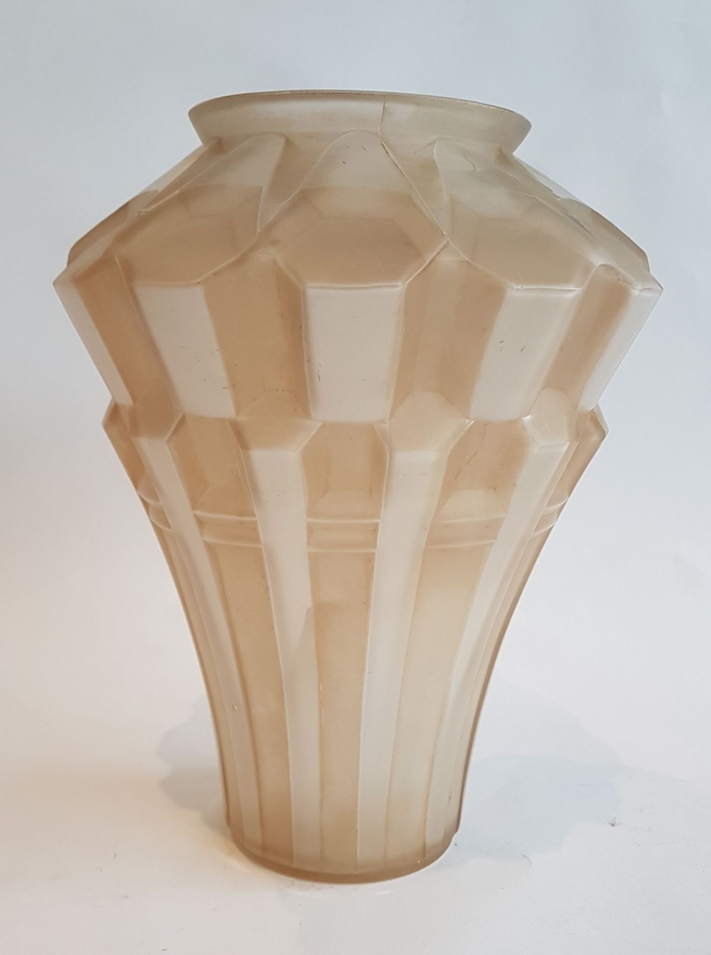 André Hunebelle (1896-1985)Serrated; Moulded pressed pink satinised glass vase. Signed. H: 23 cm