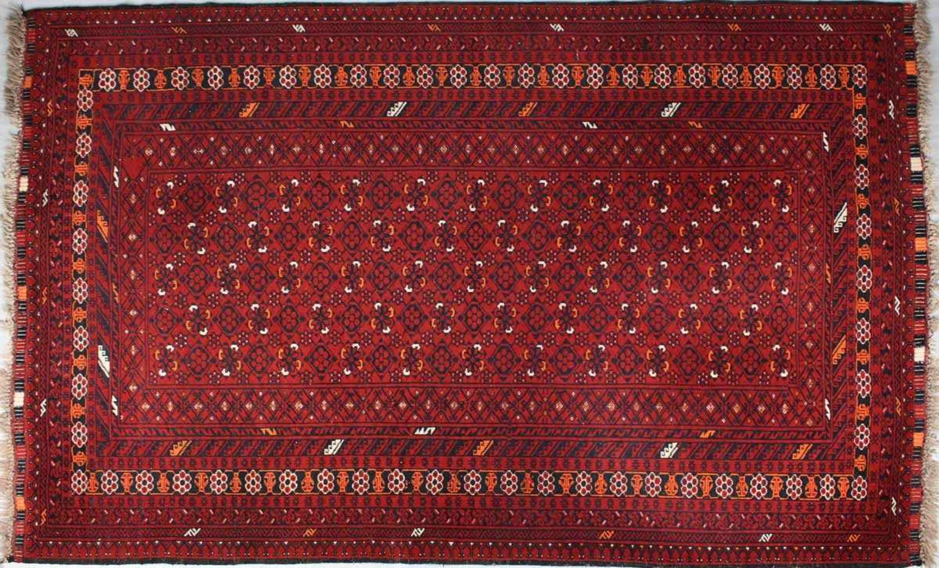 Teppich bordeauxrote Wolle, in Schwarz, Orange und Creme gemustert, rechteckiges Innenfeld mit - Bild 2 aus 2