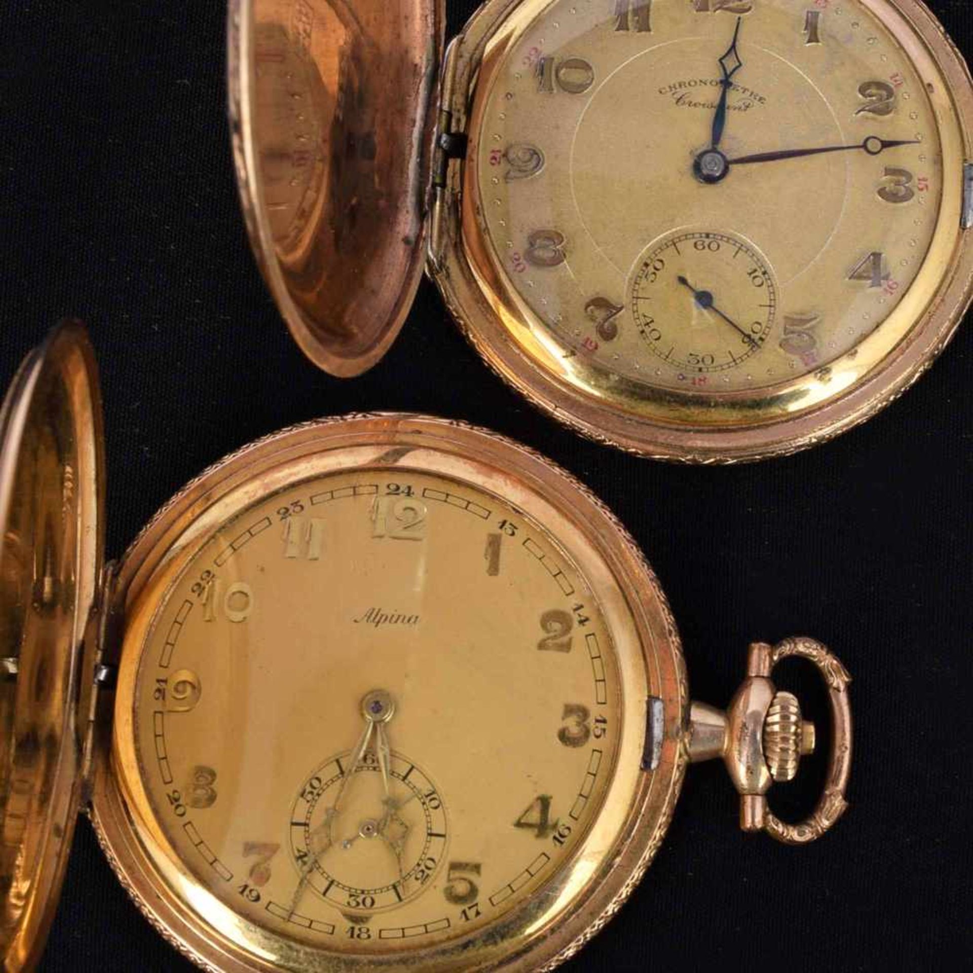 Zwei Sprungdeckeltaschenuhren Metallgehäuse vergoldet, untersch. Hersteller, Stunde, Minute und