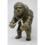 Large Carved Hunter w/ Bone Club Inuit Sculpture