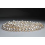 Unusual 100 inch Strand of White Freshwater Pearls