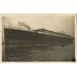 WILLIAM MACQUITTY COLLECTION - R.M.S. TITANIC: Photo postcard of Titanic after launch, pencil