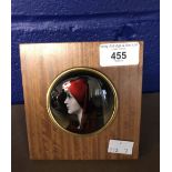 20th cent. Limoges. Iridescent enamel medallion porcelain portrait. Female head wearing a red head