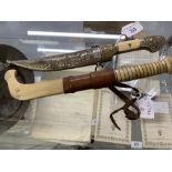 Edged Weapons: A Syrian dagger, brass scabbard carved with bird figures. Plus an Erik Frost Moria