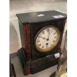 Clocks: Slate and marble mantle clock. Enamel face with Roman numerals, unmarked movement. 9ins. x