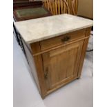 Edwardian pine washstand, single drawer over a one door cupboard with marble top. 24ins. x 30ins.