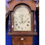 Clocks: 19th cent. Flame mahogany longcase clock. Painted arch dial, floral spandrels, dome top with