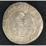 *An Edward VI fair to fine silver issue hammered shilling c1552. A clear portrait. Mint Mark tun.