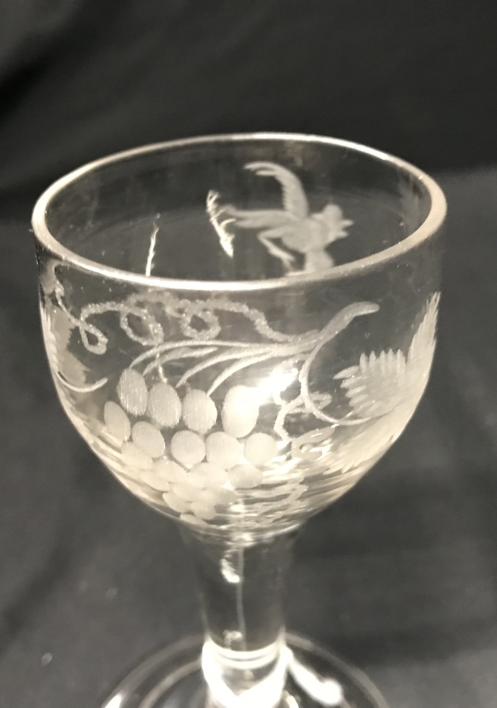 18th cent. Wine glass, ovoid bowl engraved with vine leaves and flying bird, tapering stem, uneven - Image 3 of 3