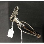 Corkscrews/Wine Collectables: 18th cent. Silver and steel folding bow screw and crested clip with
