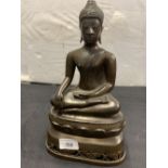 20th cent. Bronze Buddha of generous proportions. 12ins.