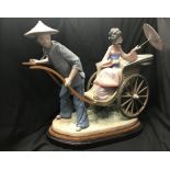 20th cent. Lladro large figures 'Rickshaw Ride', one thumb a/f. 12ins x 16ins.