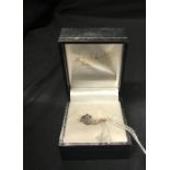 Jewellery: 20th cent. cross over diamond ring (tests 18ct.). Size N.