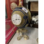 Decorative ostrich egg with photo frames and a clock inserts on a gilt metal mount. 13ins.